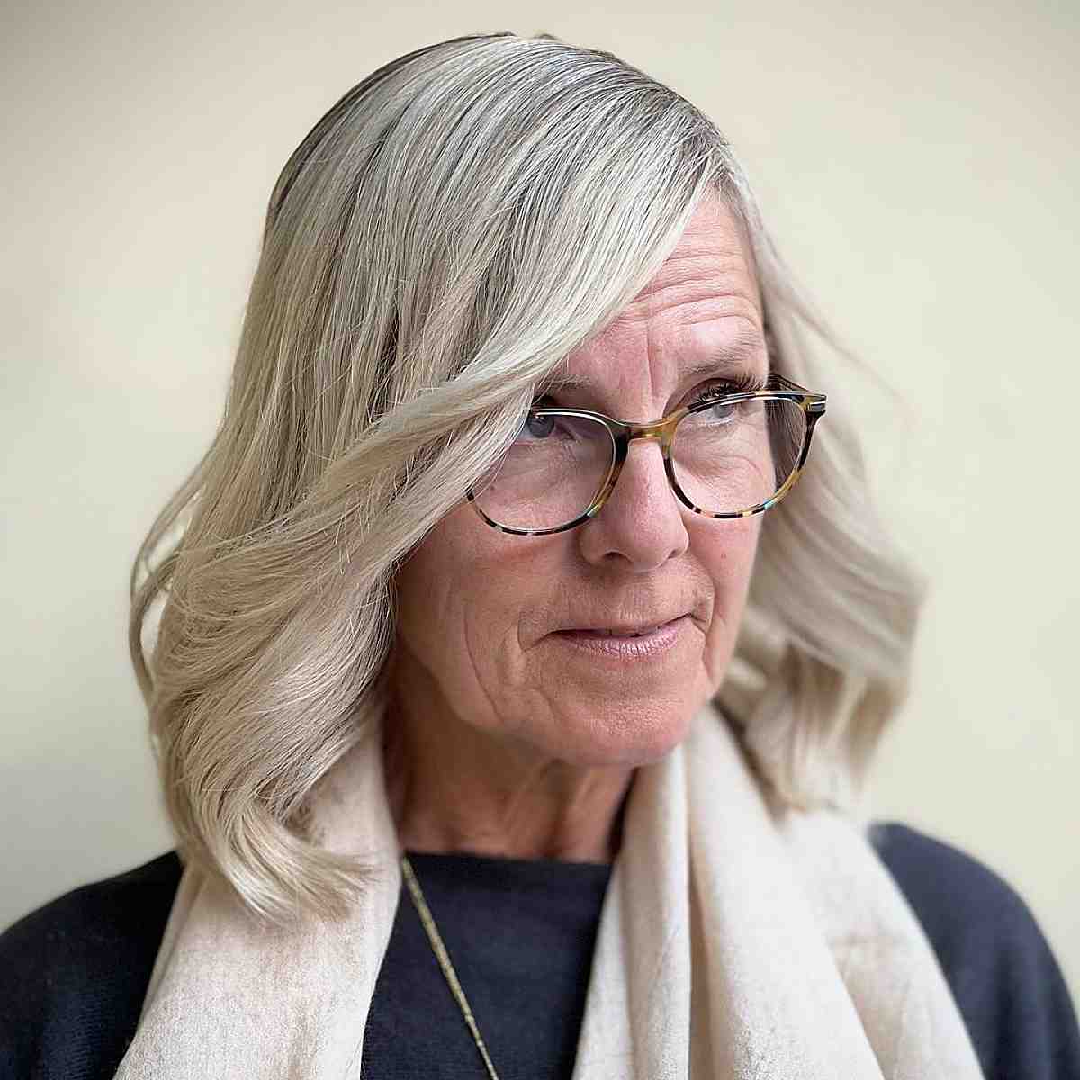 Long Bob for 70-Year-Old Women with Glasses