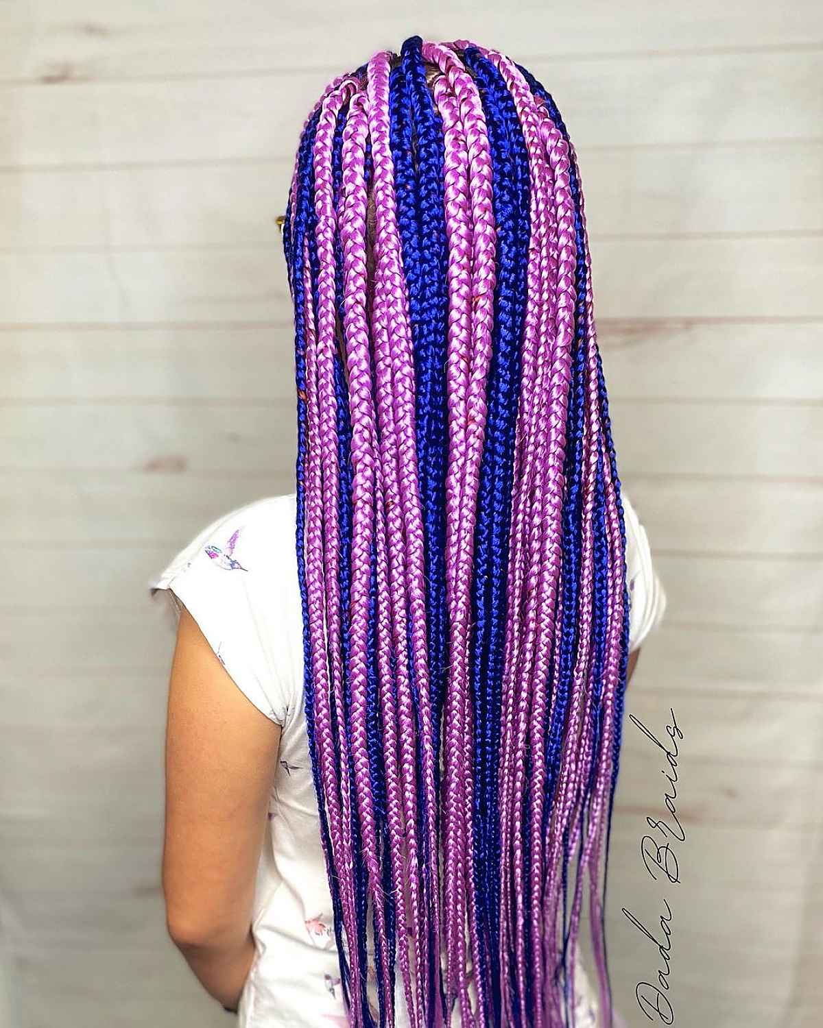 Long box braids with blue and pink hues