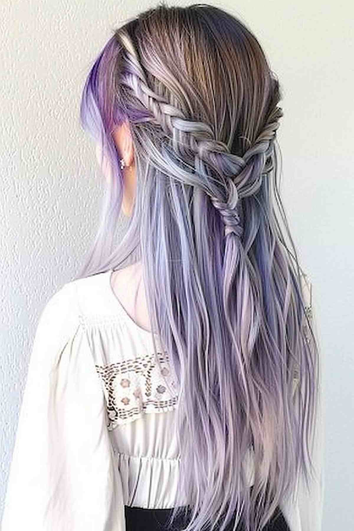 Long braided hair blending cool silver into vibrant purple tones