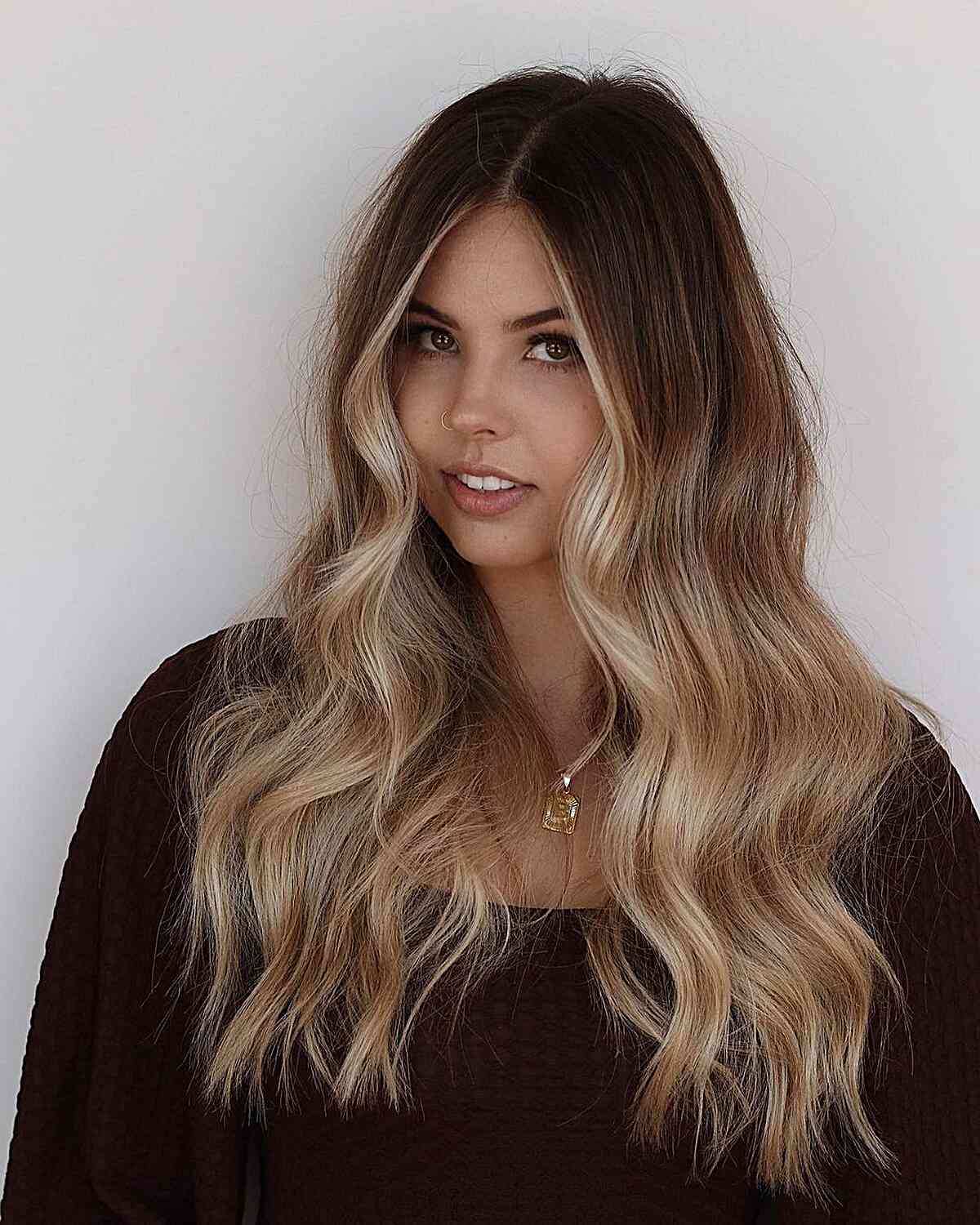 Long Brown Waves with Ashy Blonde Face-Framing Balayage Strands and Mid-Lengths