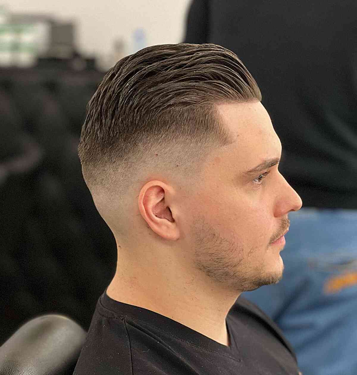 Long Brushed Back Hair with High Fade