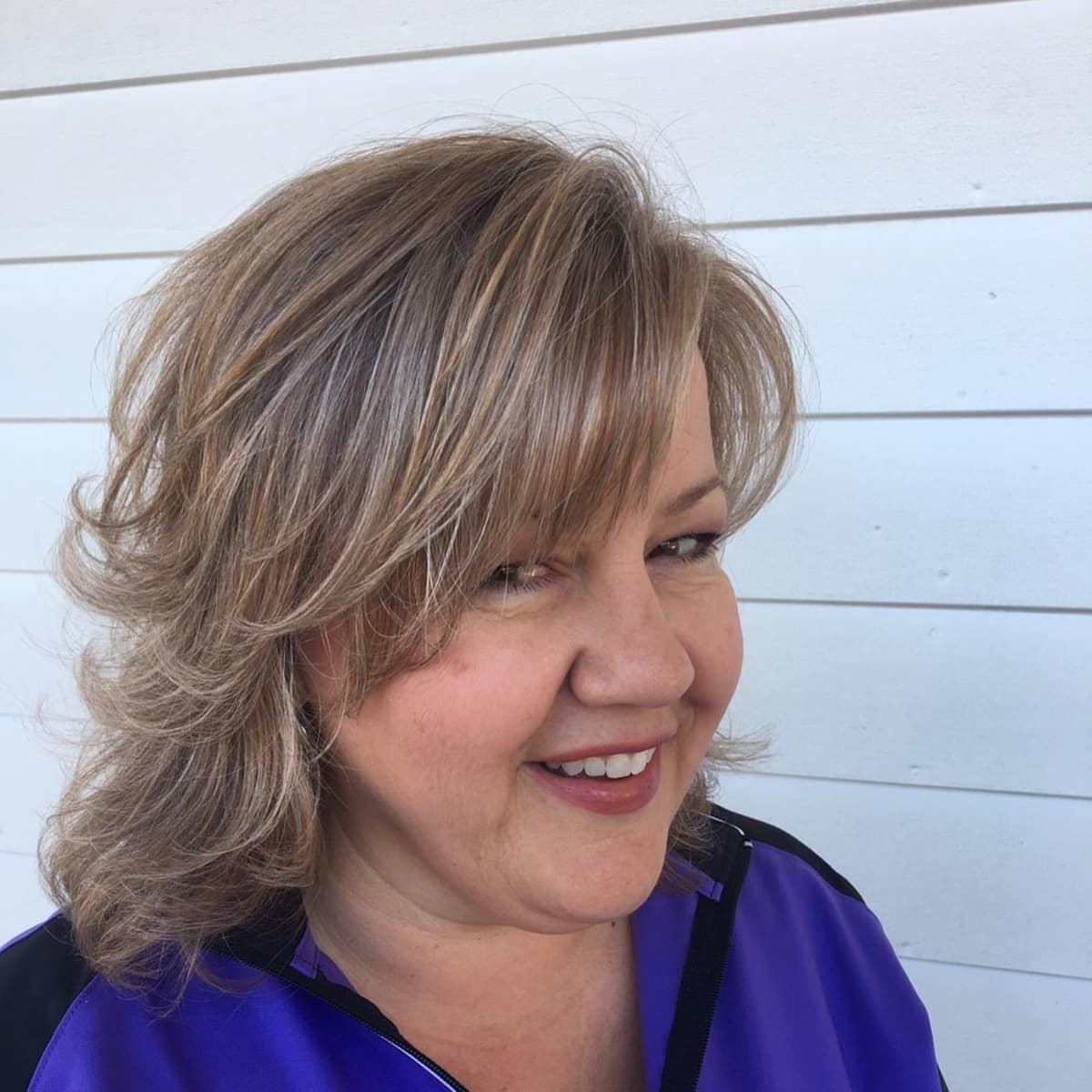 Long choppy bob for women over 60 with round faces
