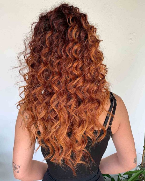 A Long Coppery Ombre for Curly Hair
