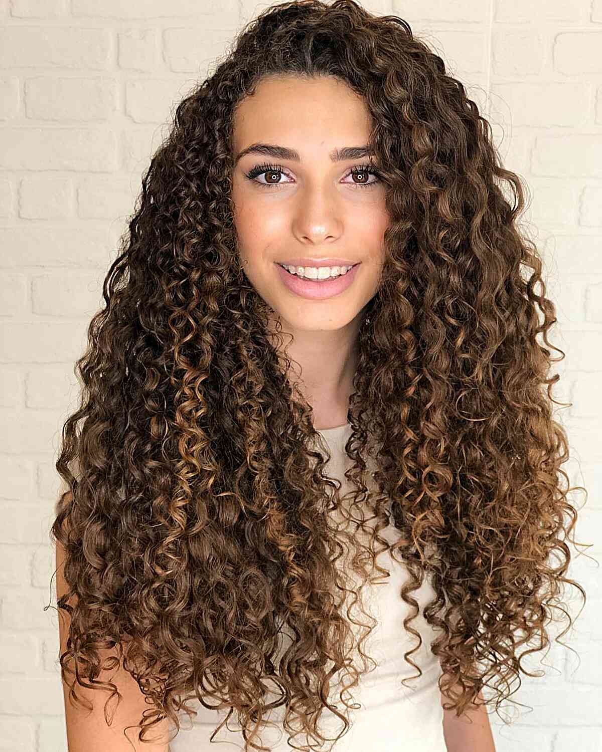 Long Curly Hair with a Subtle Side Part