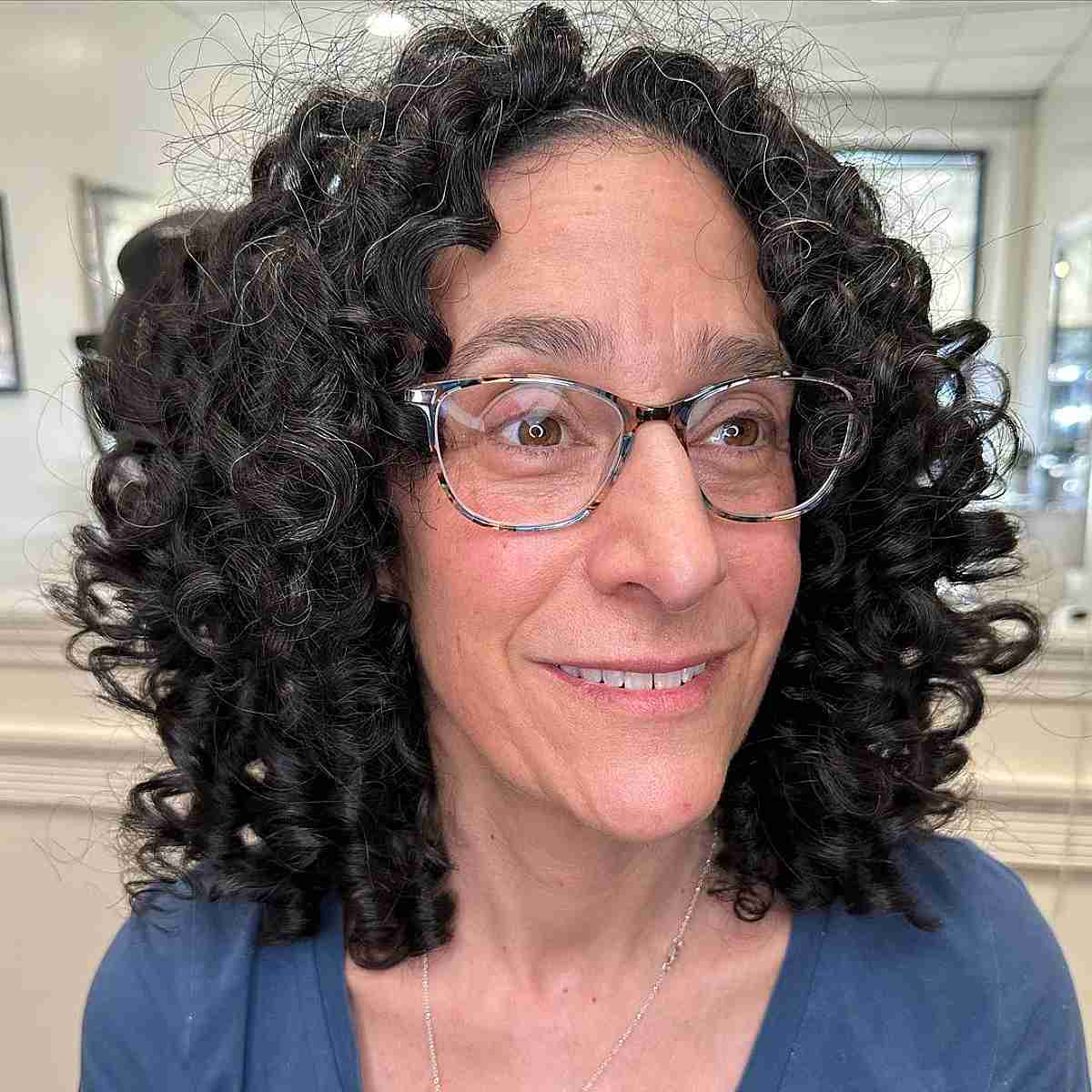 Long Curly Style for Women Past 50 with Glasses