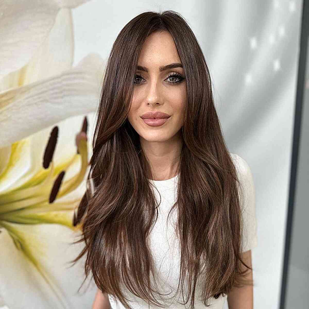 Long Dark Brown Hair with an Off Center Part for women with long faces