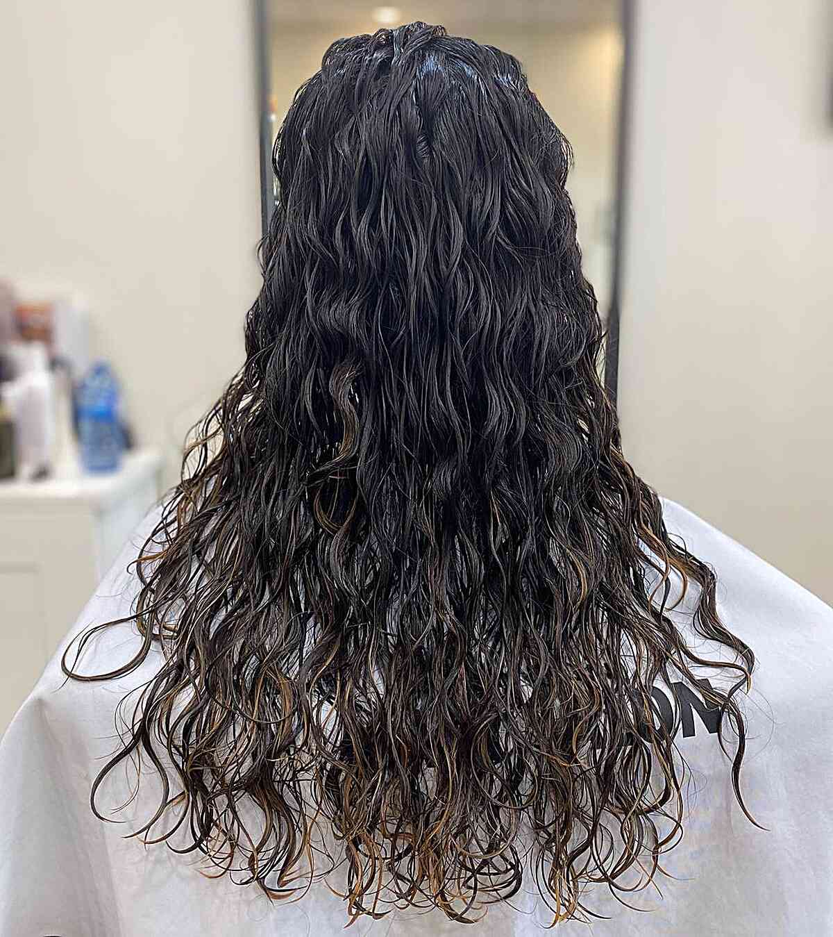 Long Dark Hair with Spiral Body Wave Perm