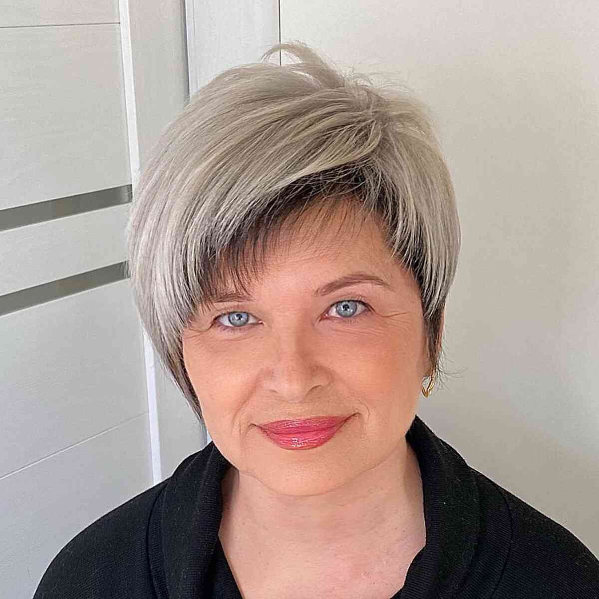 Long Edgy Pixie with Asymmetric Bangs for older women over 50 with round faces