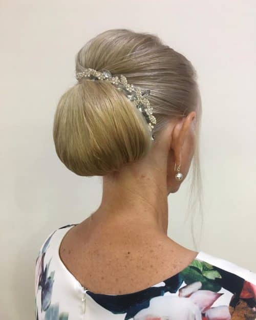long elegant chignon hairstyle for woman over 50