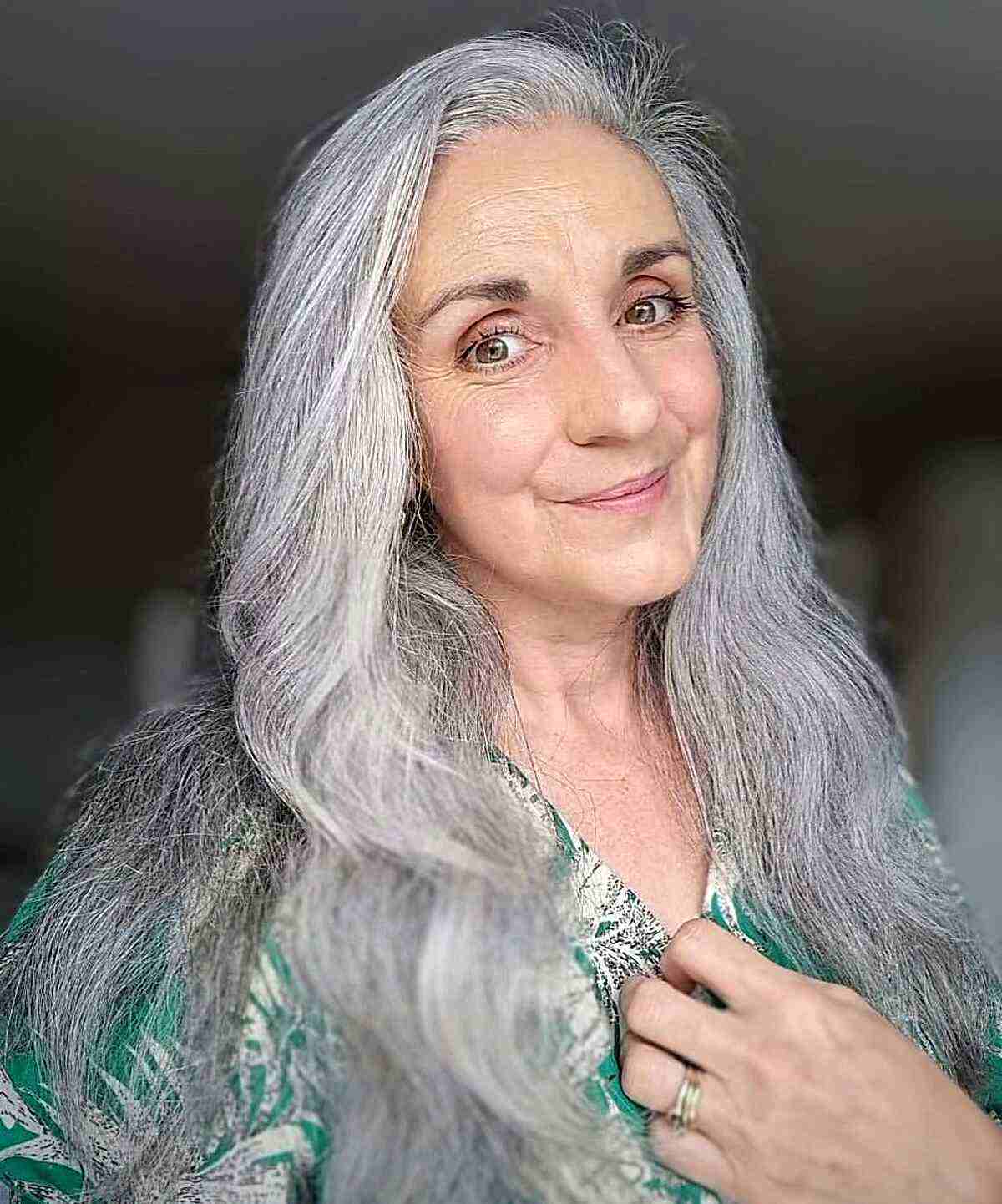 Long Grey Hair with Deep Side Part for Seniors Over Sixty with Thicker Mane