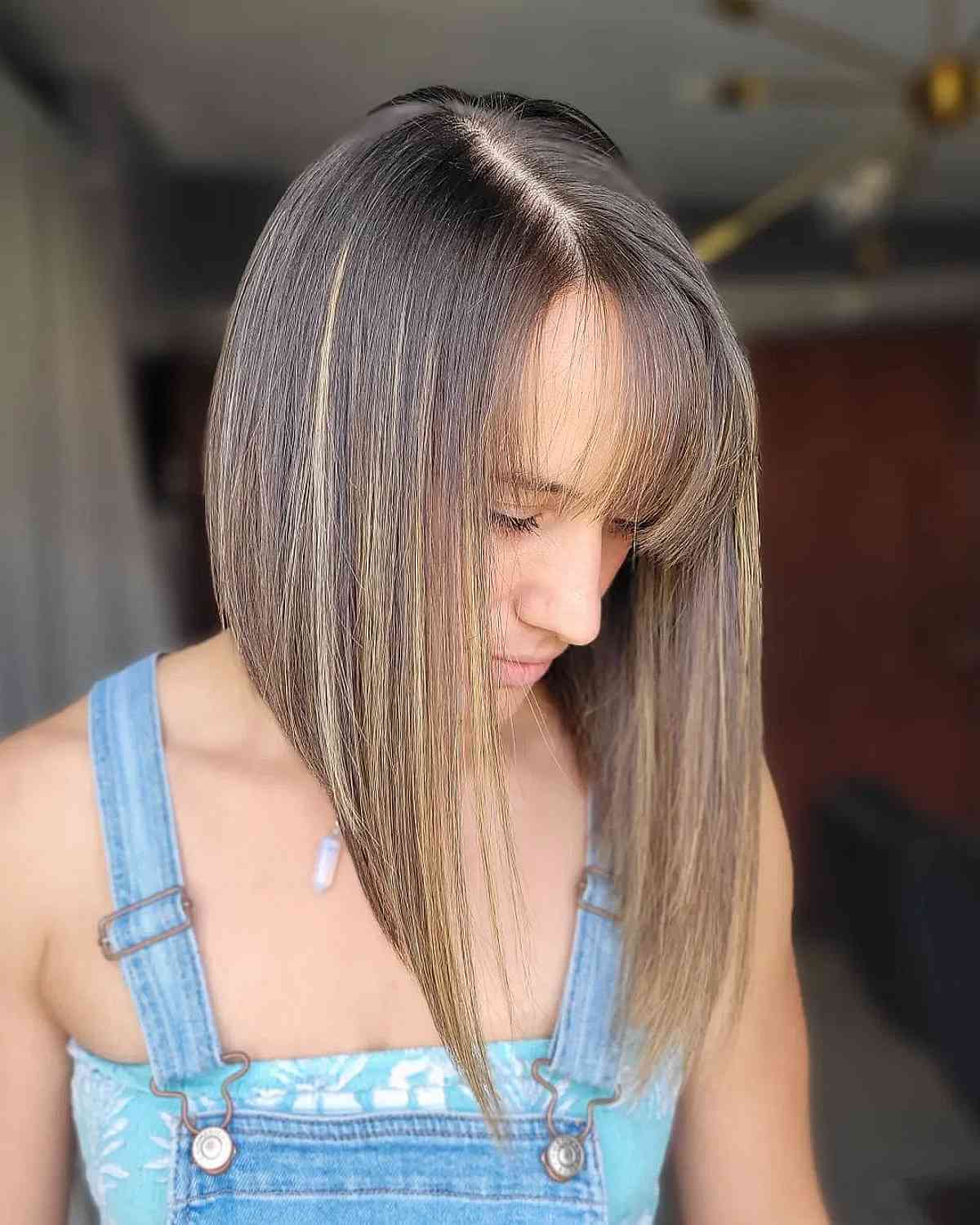 Long Inverted Bob Cut with a Side Part and Fringe for Thin Hair