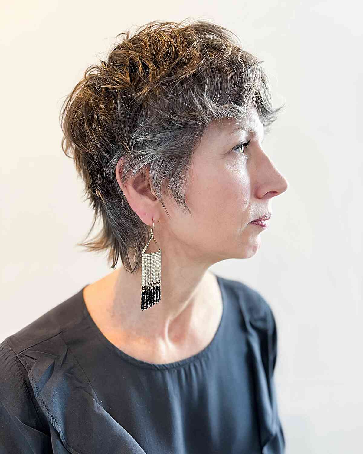 Long Jagged Pixie Haircut with Bangs for Mature Women