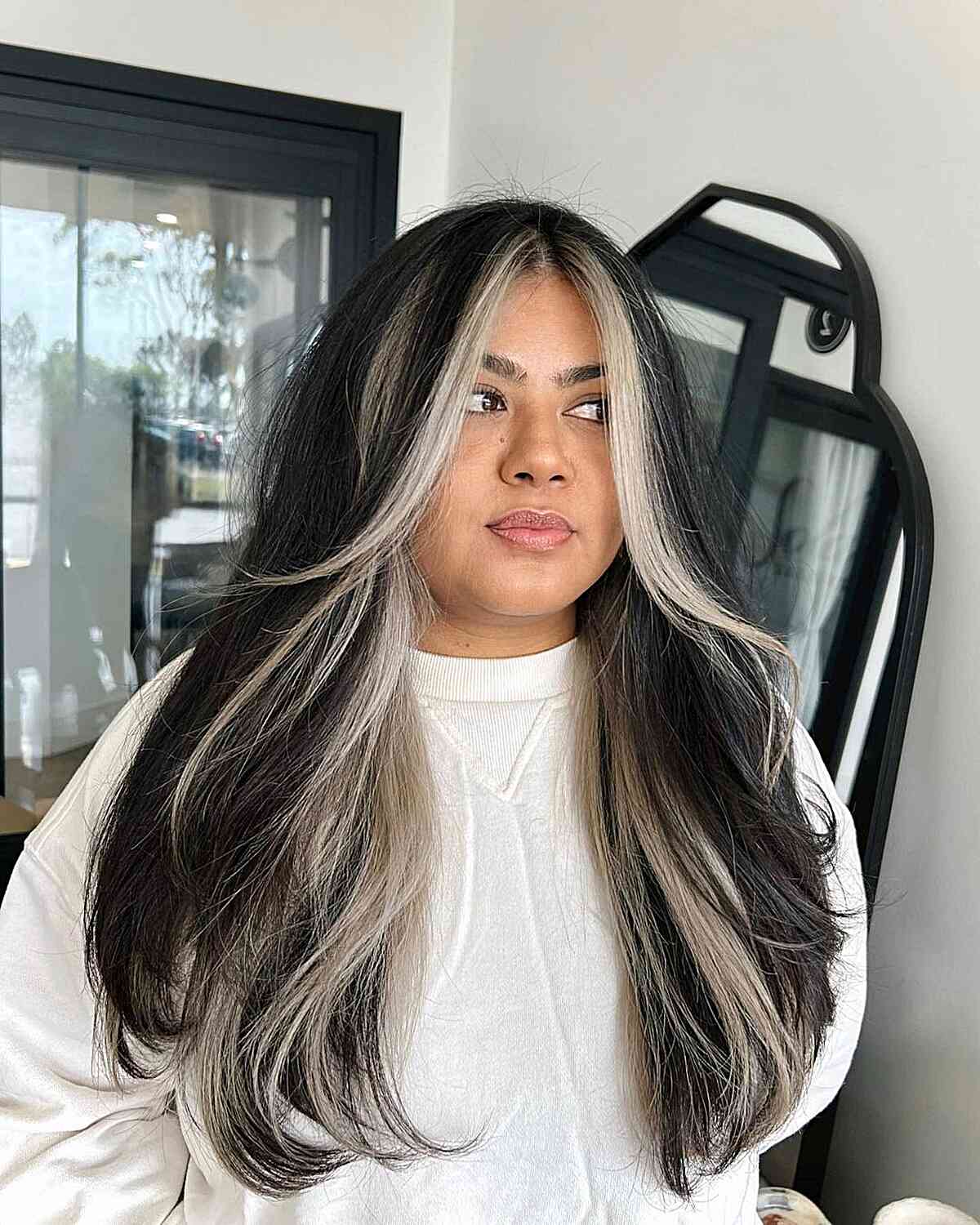 Long Layered Black Hair with White-Blonde Money Piece for Full-Shaped Faces