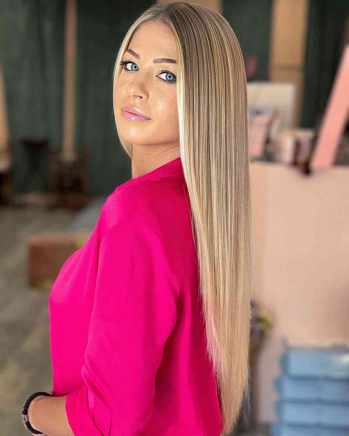 Sleek Long Layered Blonde V-Cut