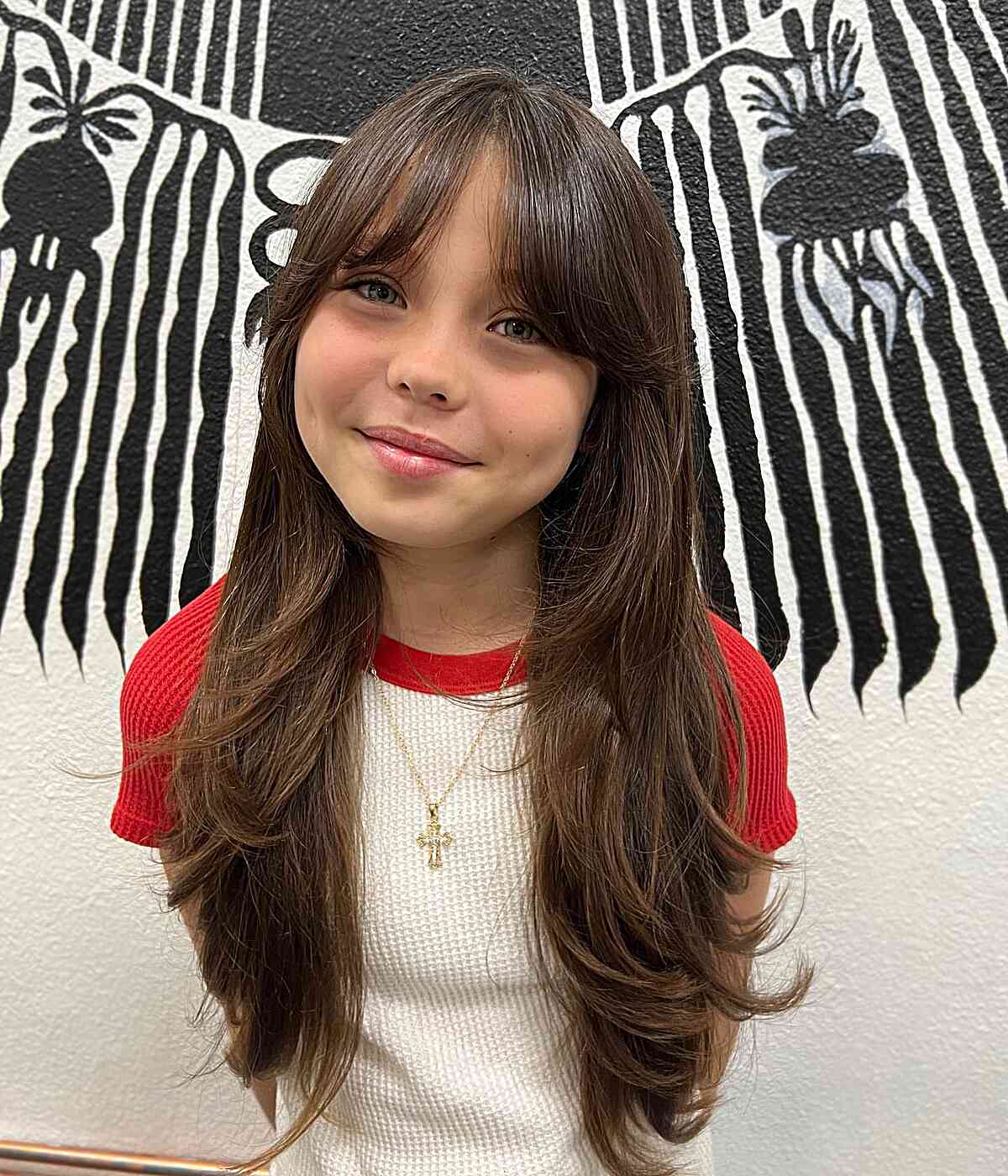 Long Layered Cut with Curtain Bangs for Little Girls