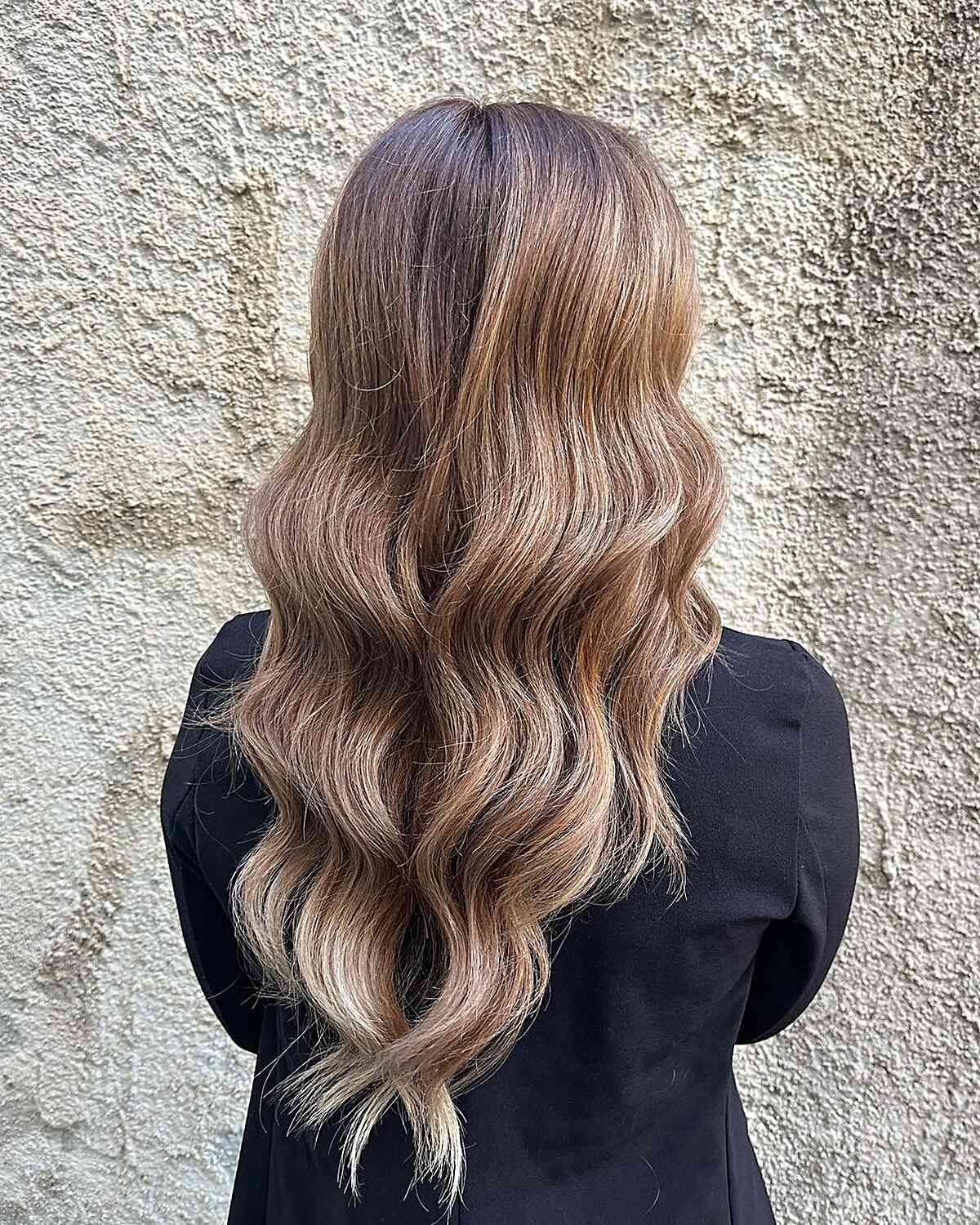 Long Layered V-Cut Hair with Soft Waves and Warm Shade