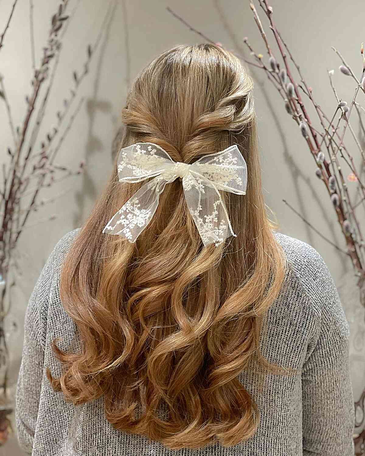 Long Layered Wavy Hairstyle with Bow for Bridal Guests