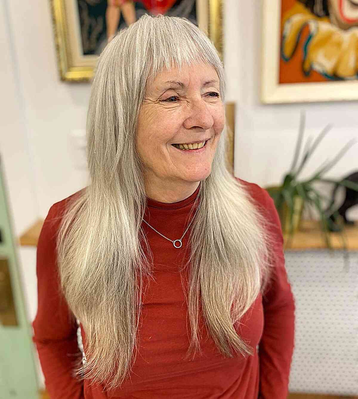 Long Layers and Short Textured Bangs for 60-Year-Old Ladies with Thick Locks