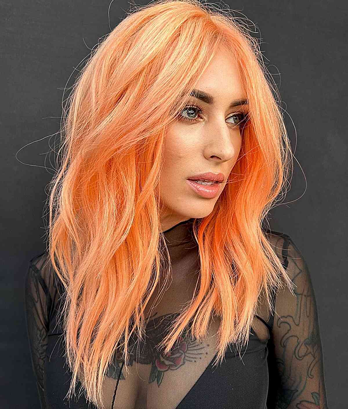Long Neon Orange Hair for women with an edgy style