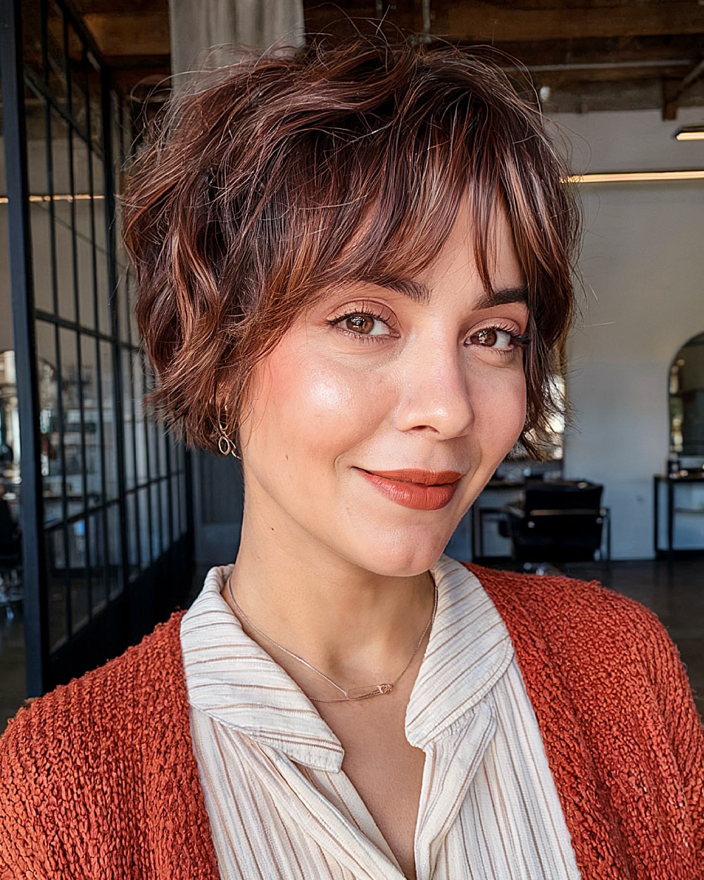 Shag-inspired long pixie with tousled layers and soft curtain bangs for movement