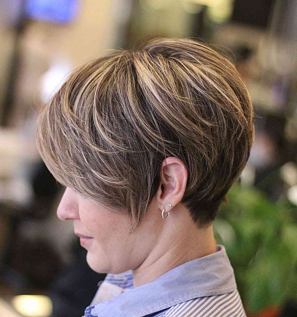 Long Pixie with Short Wispy Layers and Blonde Highlights for Older Ladies