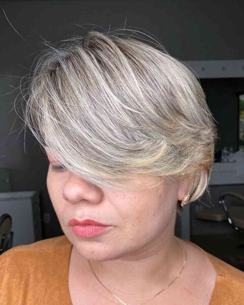A Long Pixie with Swoop Bangs for Round Faces