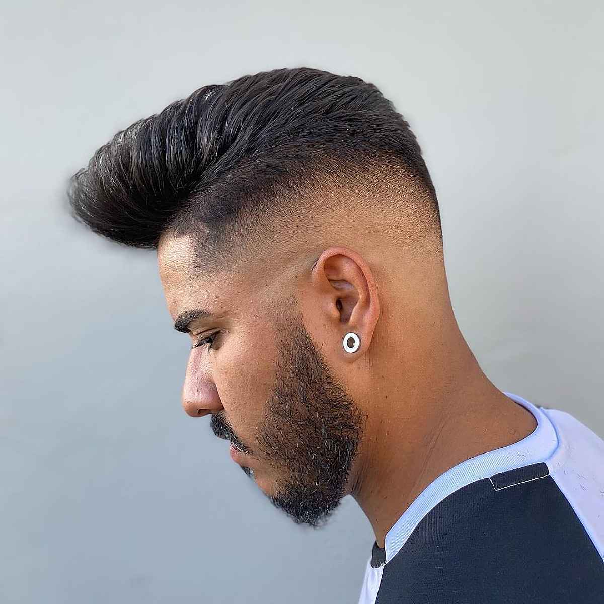 Straightway Barber Shop - Hairstyle Info =========== The undercut fade is a  beautiful combination of two popular men's haircuts – the undercut and fade.  Because the faded undercut makes for a great