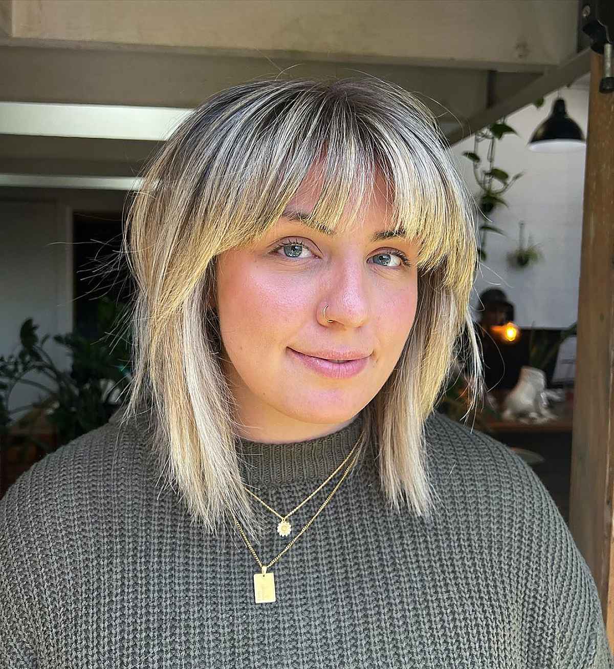 Long Shaggy Bob with Arched Bangs