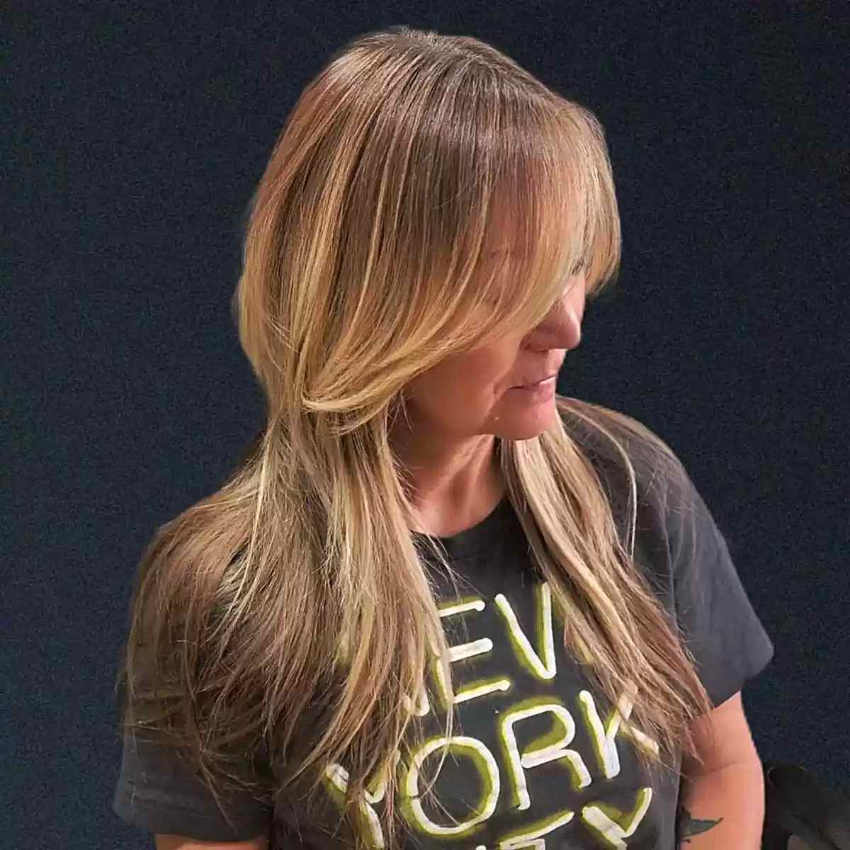 Long Sleek Fine Hair with Long Bangs and Subtle Layers for Ladies Over 50
