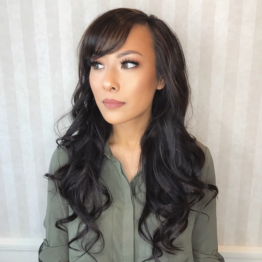 Long Soft Curls with Side-Swept Bangs for Fine and Wavy Hair