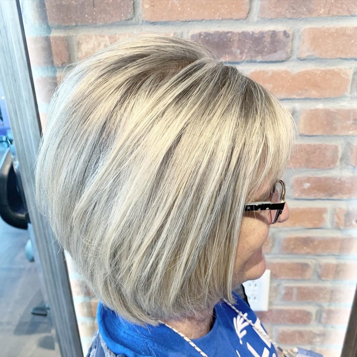 Long stacked bob haircut for women over 50