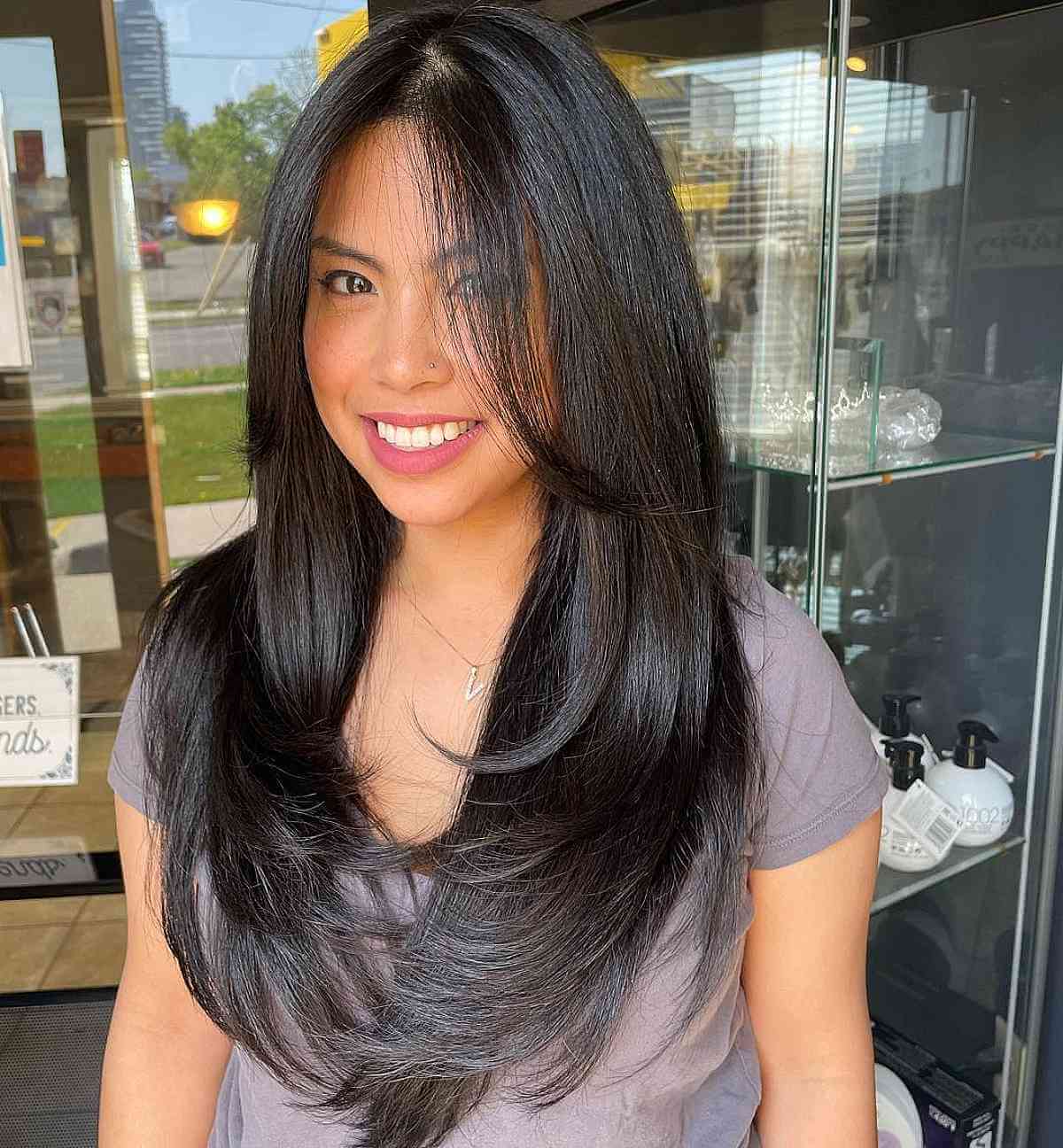 Long Straight Hair with Long Layering for Round Faces