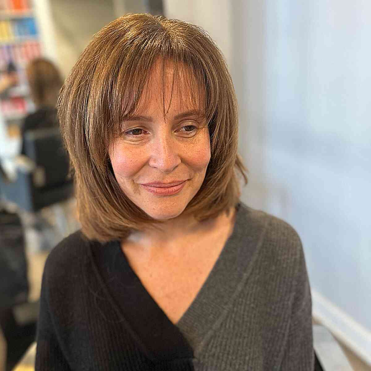 Long Textured Bob with Thin Bangs and layers for older women with thin hair