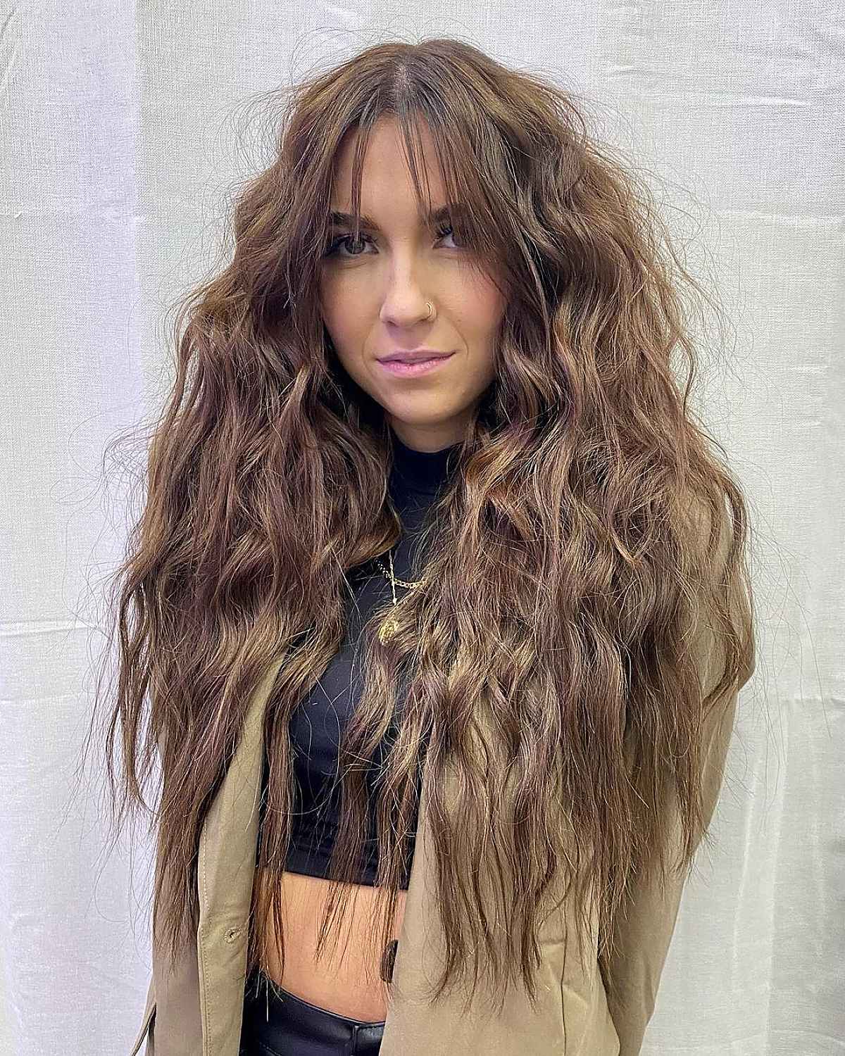 Long Textured Hair with Middle-Parted Wispy Bangs