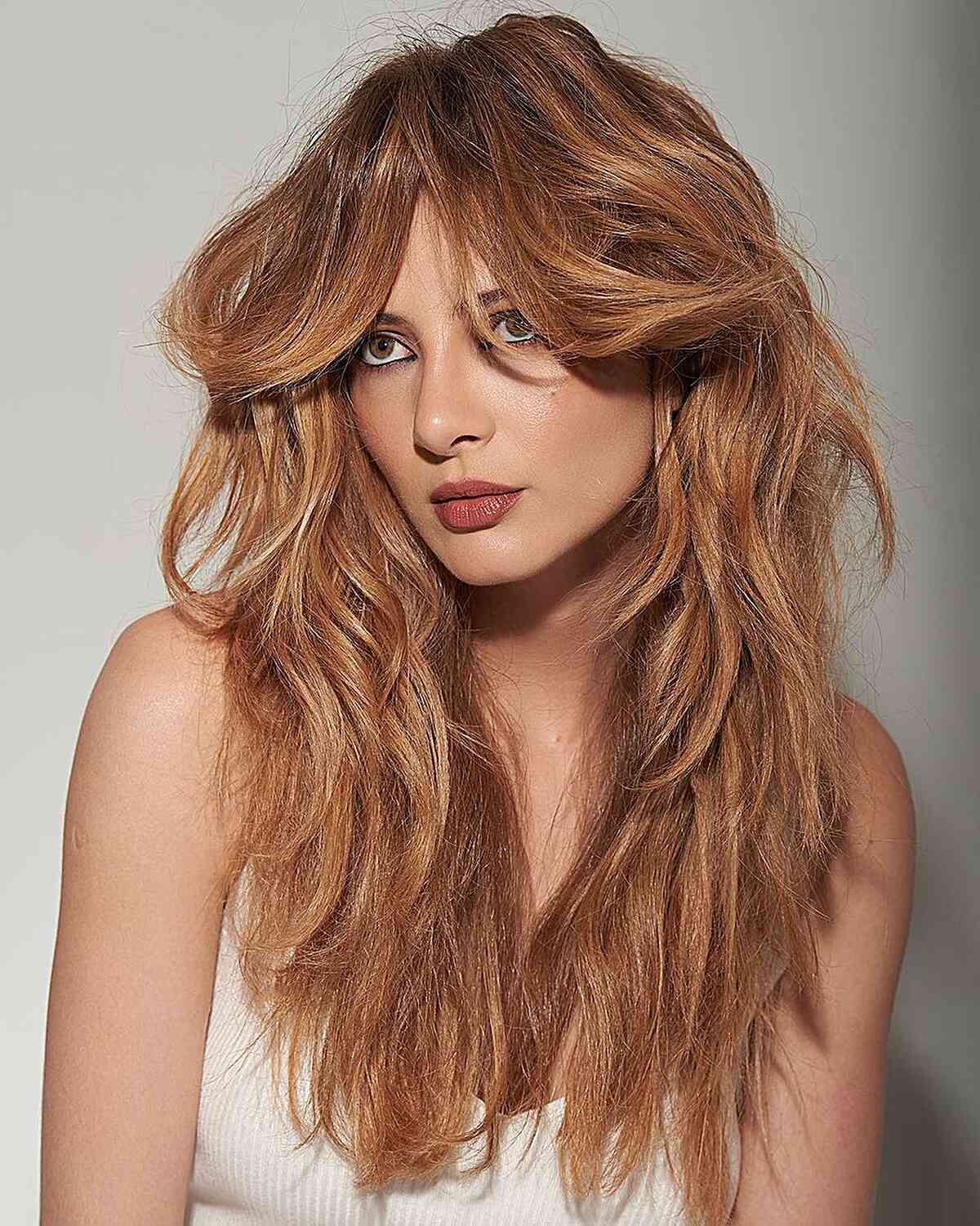 Long, Thick Shaggy Cut with Curtain Fringe for ladies with layered long hair