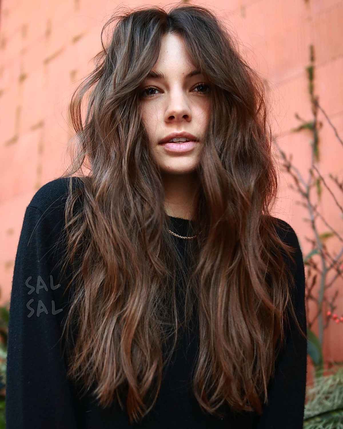 Long Tousled Layers with Face-Framing Bangs