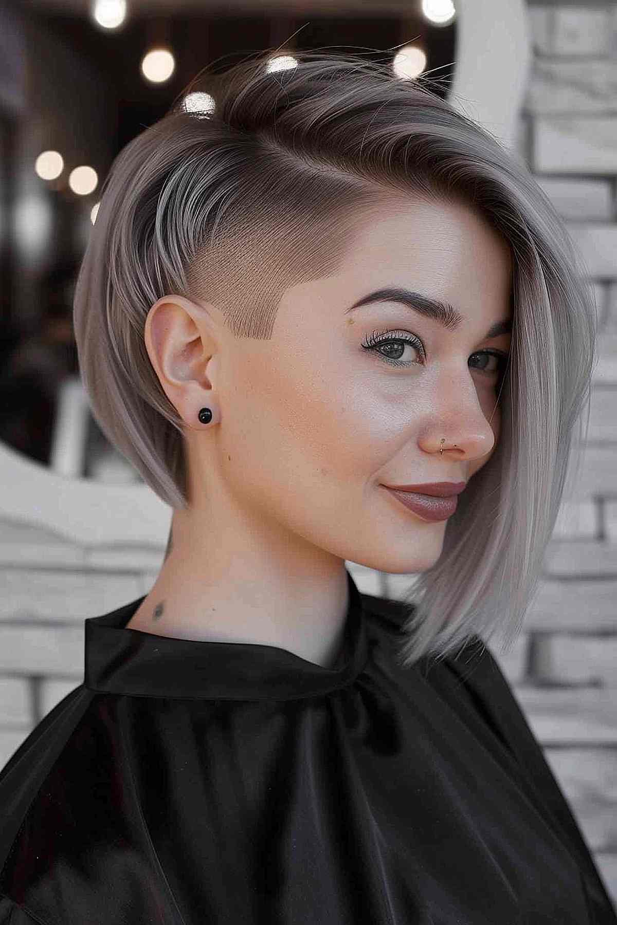 Sleek long undercut bob with dramatic side shave for fine to medium hair types, perfect for oval and heart-shaped faces