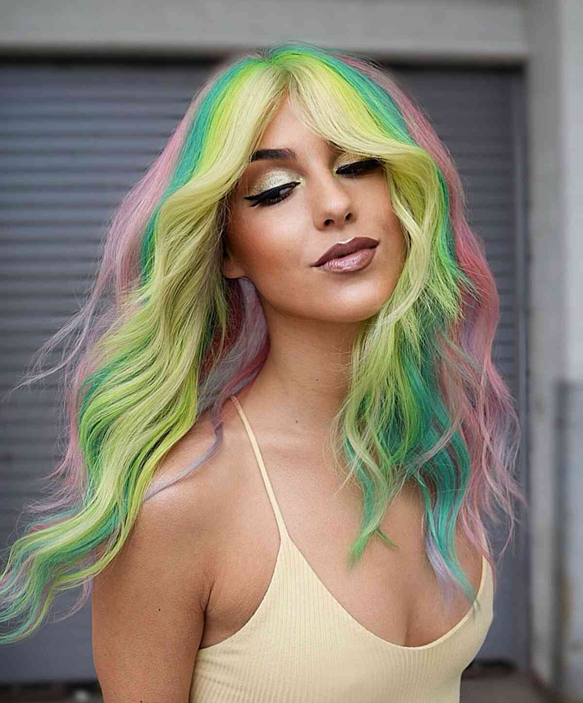Long Unicorn-Inspired Wavy Hair Color Idea for women with lived-in hair