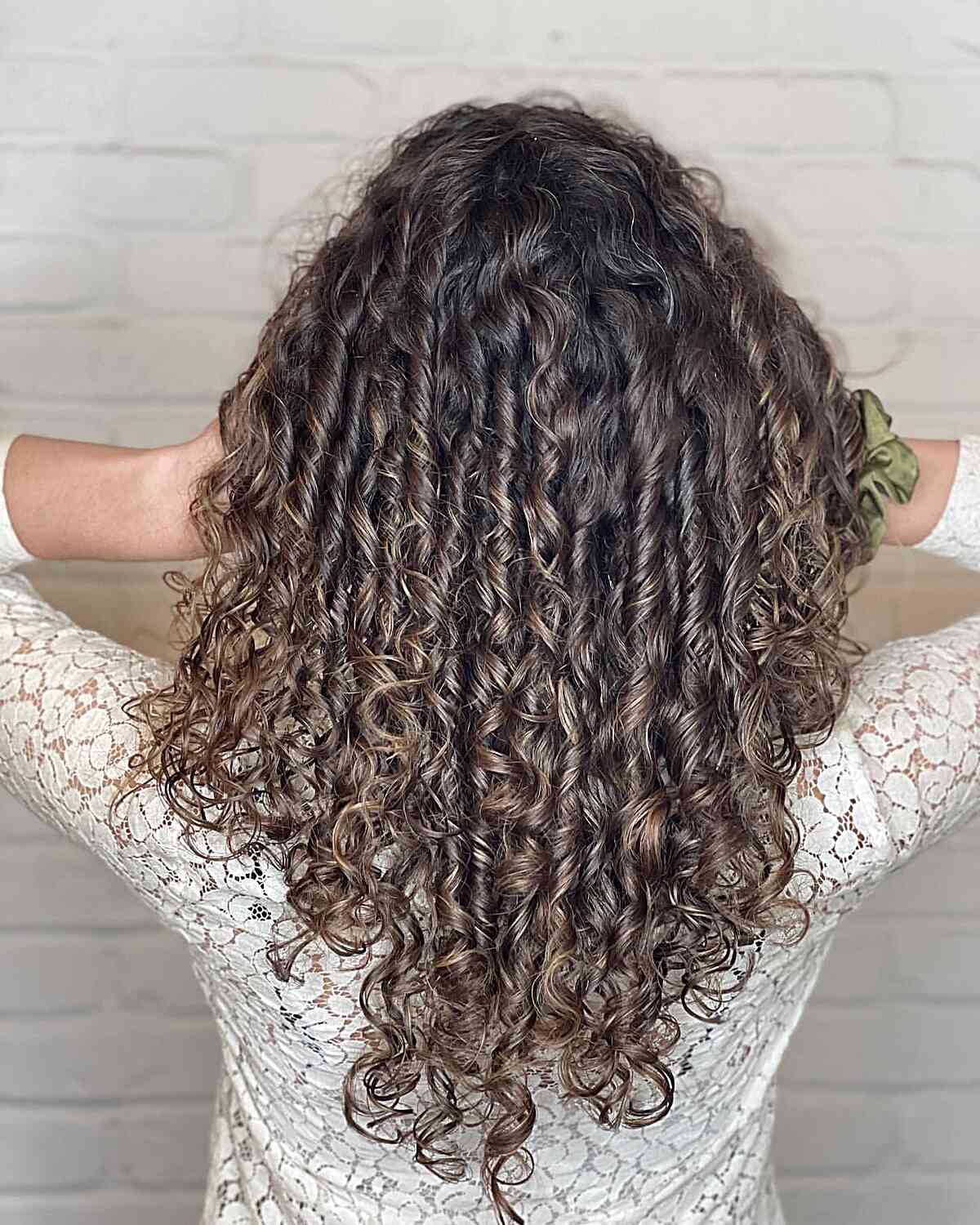Long V-Cut Curly Hair with Layers