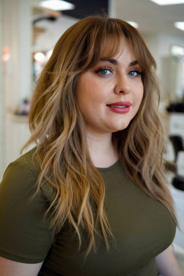 17 Flattering Wavy Hair with Bangs Styles for Round Faces in 2026