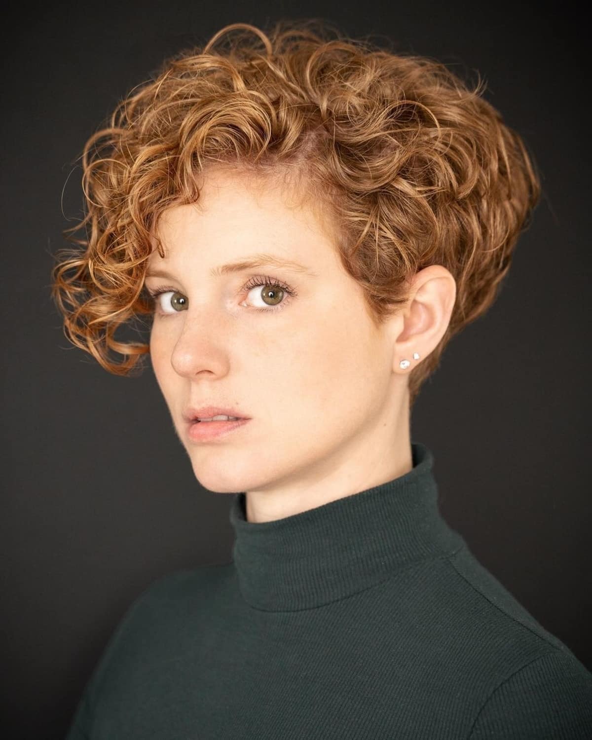 Long wavy pixie cut with curls