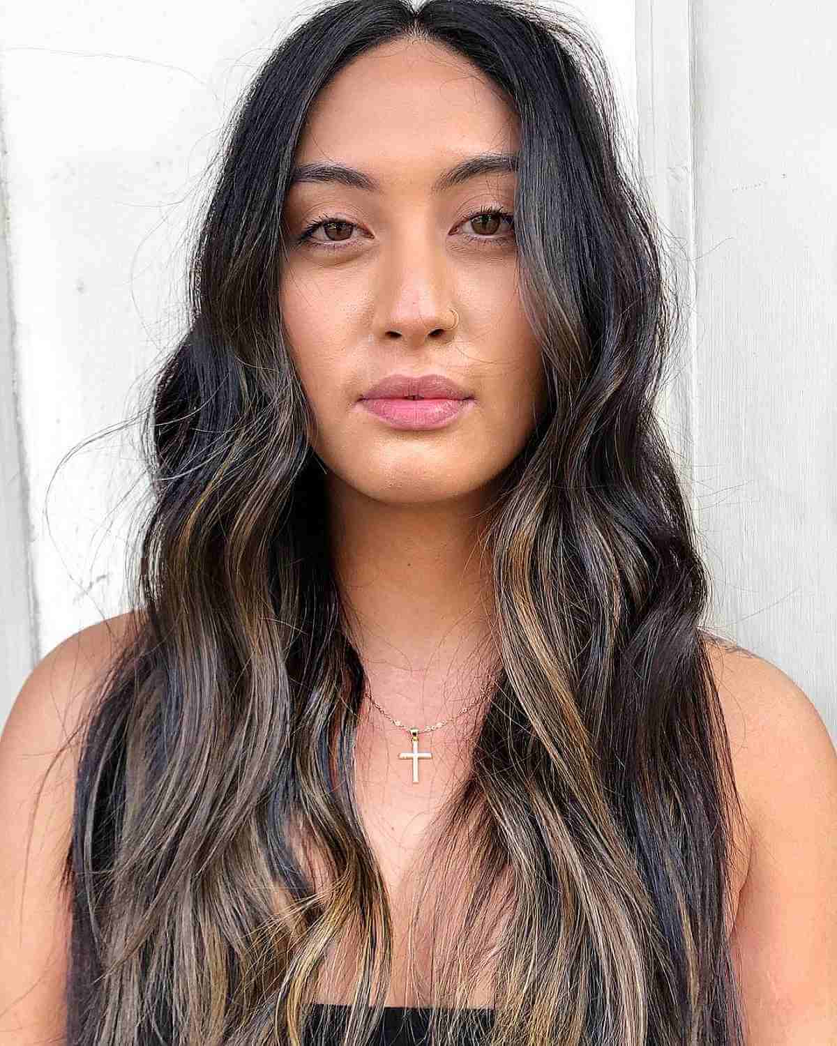 Long Wispy Hair with Foilayage Highlights for Long Face Shapes