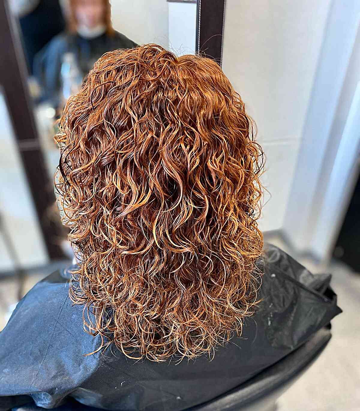 Loose Curly Perm Body Waves with Mid-Length Layers
