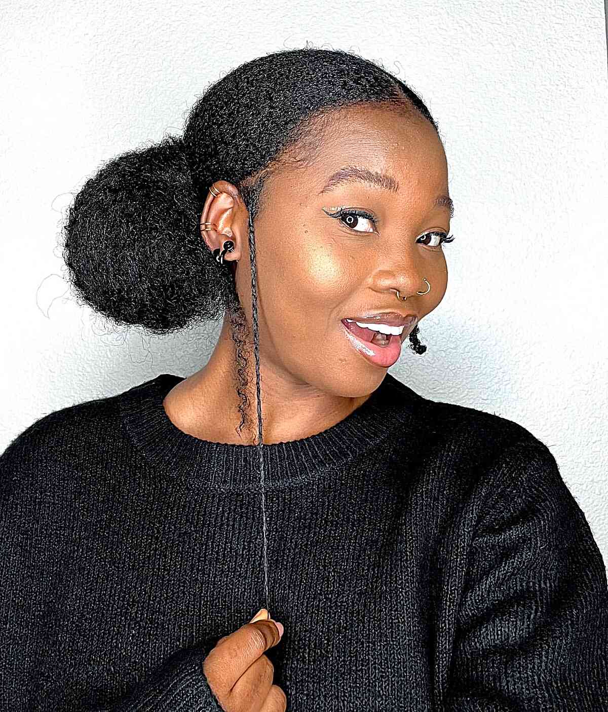 Low Bun Updo Style with Middle Part for Young Black Ladies