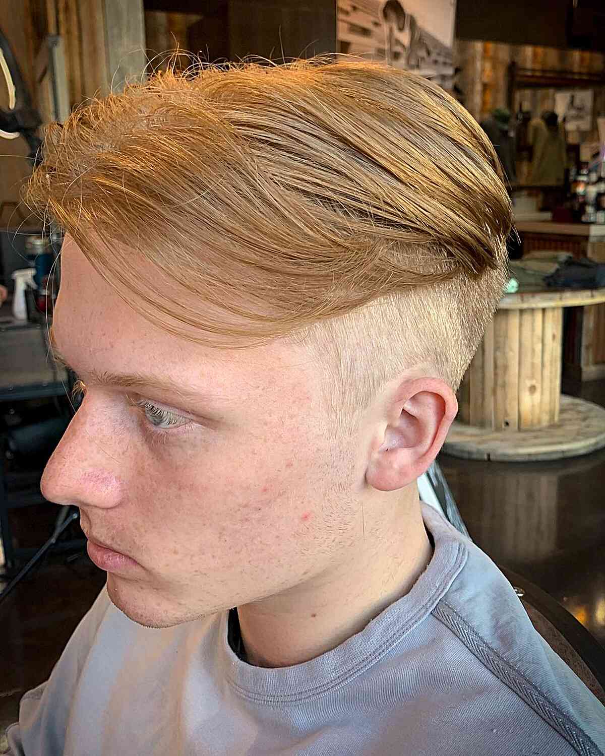 Low Fade Comb Over With an Undercut for Guys