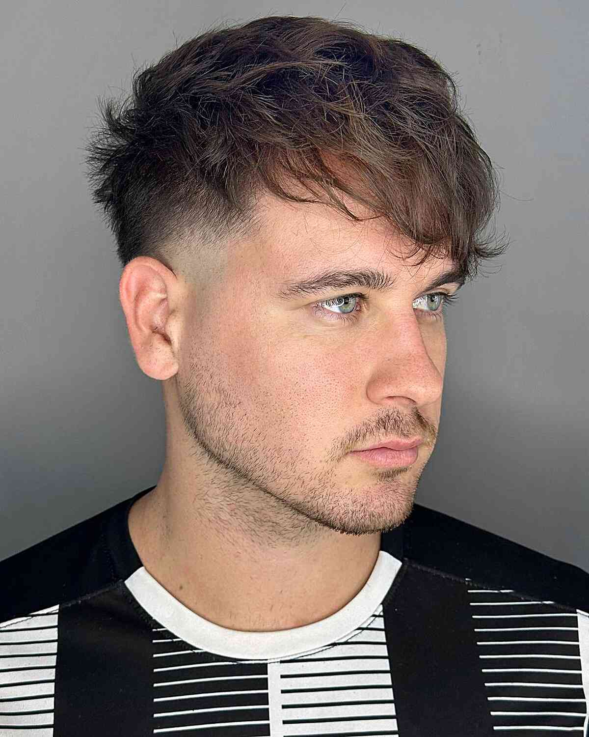 Low Fade Messy French Crop with Side Bangs on Gents