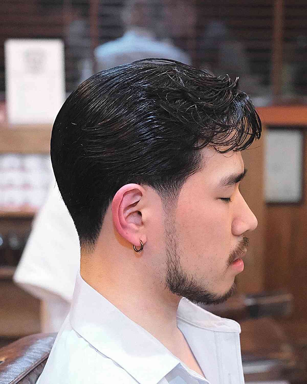 Low Faded Tapered Straight Hair with Bangs for gentlemen with straight, black hair