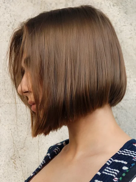 A Low-Maintenance Brunette Blunt Bob with Front Wispy Layers