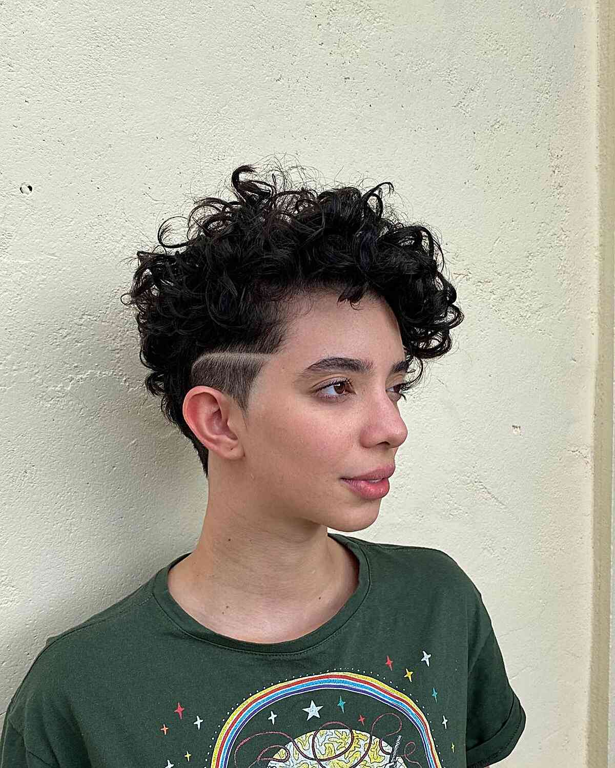 Low-Maintenance Curly Pixie Undercut with Shaved Line