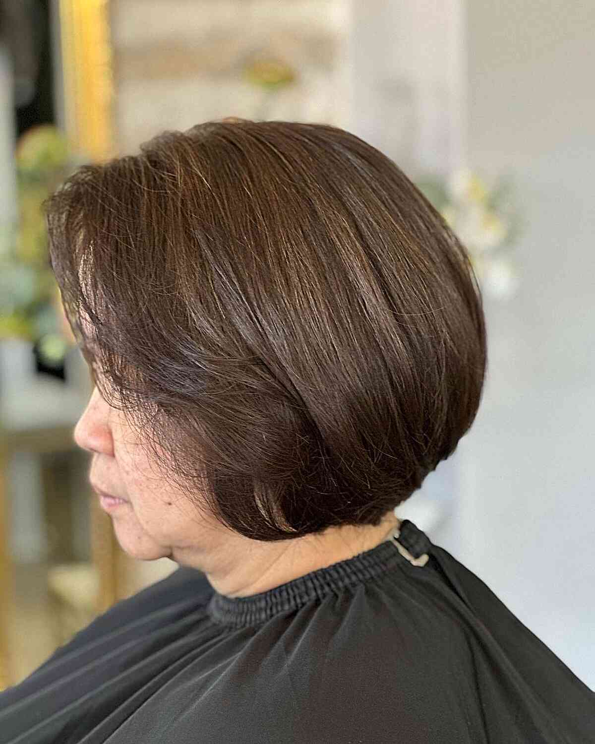 Low-Maintenance Jaw-Length Inverted Brown Bob for Ladies Aged 60+